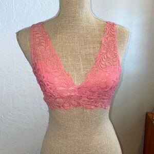 Cute lace bralette in light pinky salmon hue. XS